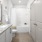 spacious, well-lit bathroom with a double vanity