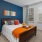 Bedroom with natural lighting and high ceilings