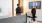 a person in a lobby helping a woman